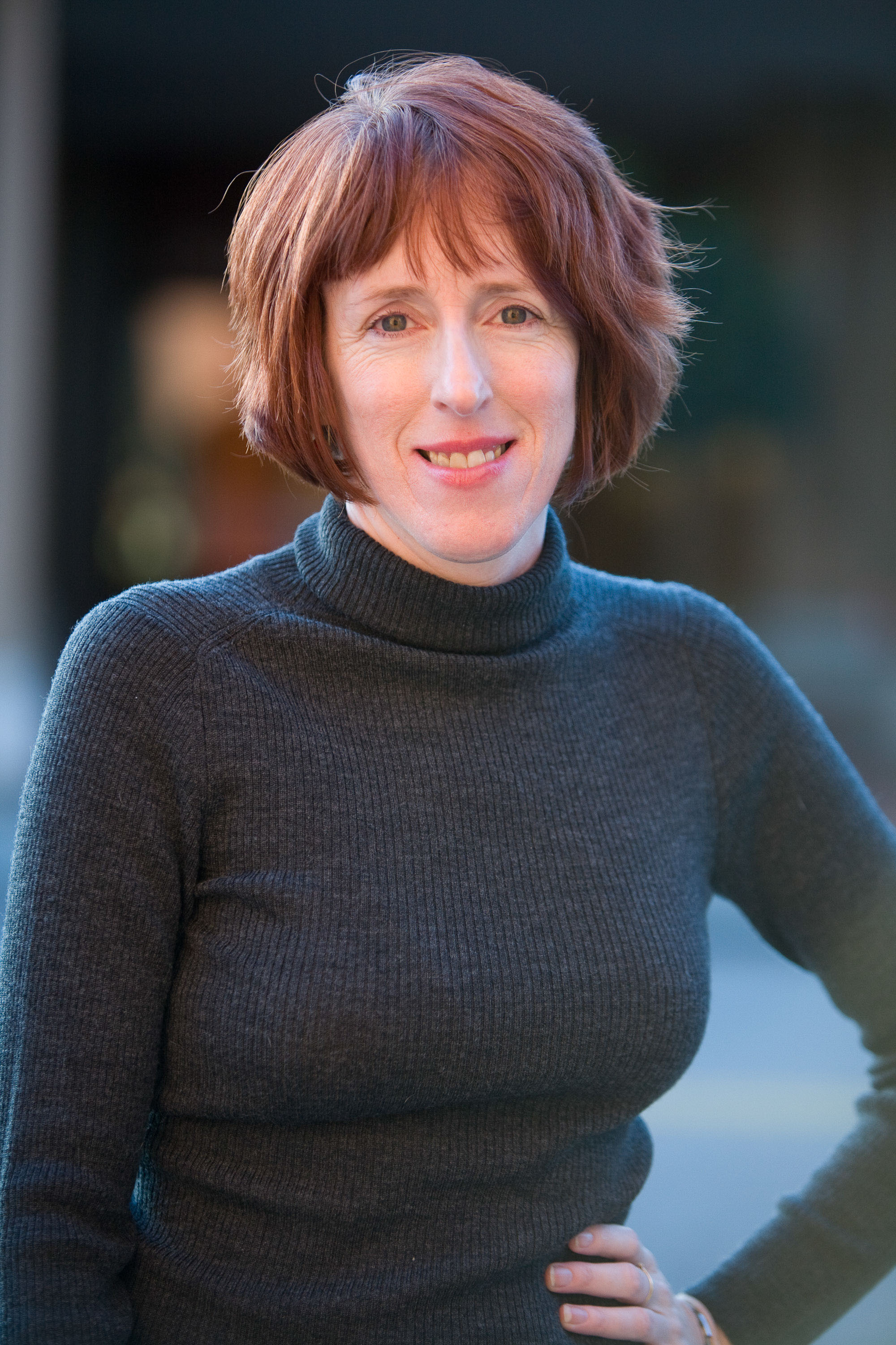 Softly lit outdoor portrait of Oakland-based editor and writer Christine Kent, ckeditorial.com