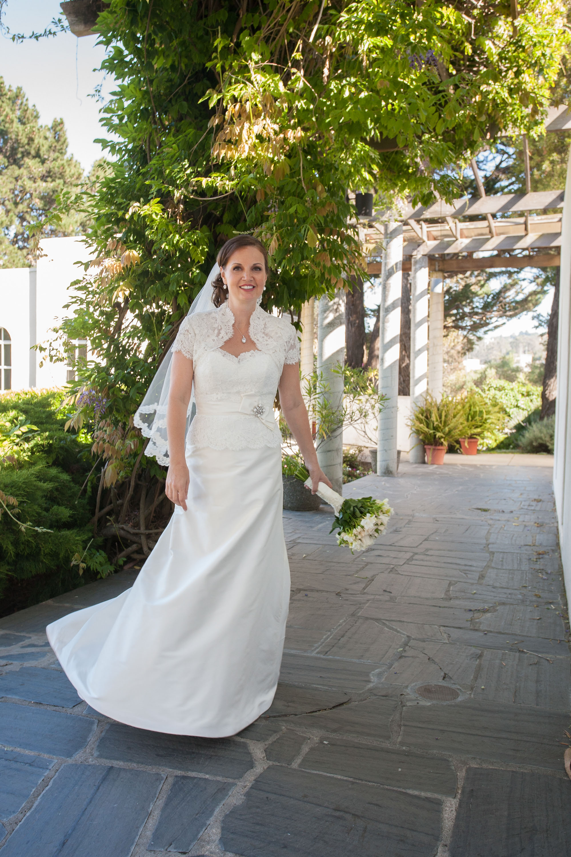 The bride dances after her wedding,  at the Garden Court Hotel in Palo Alto