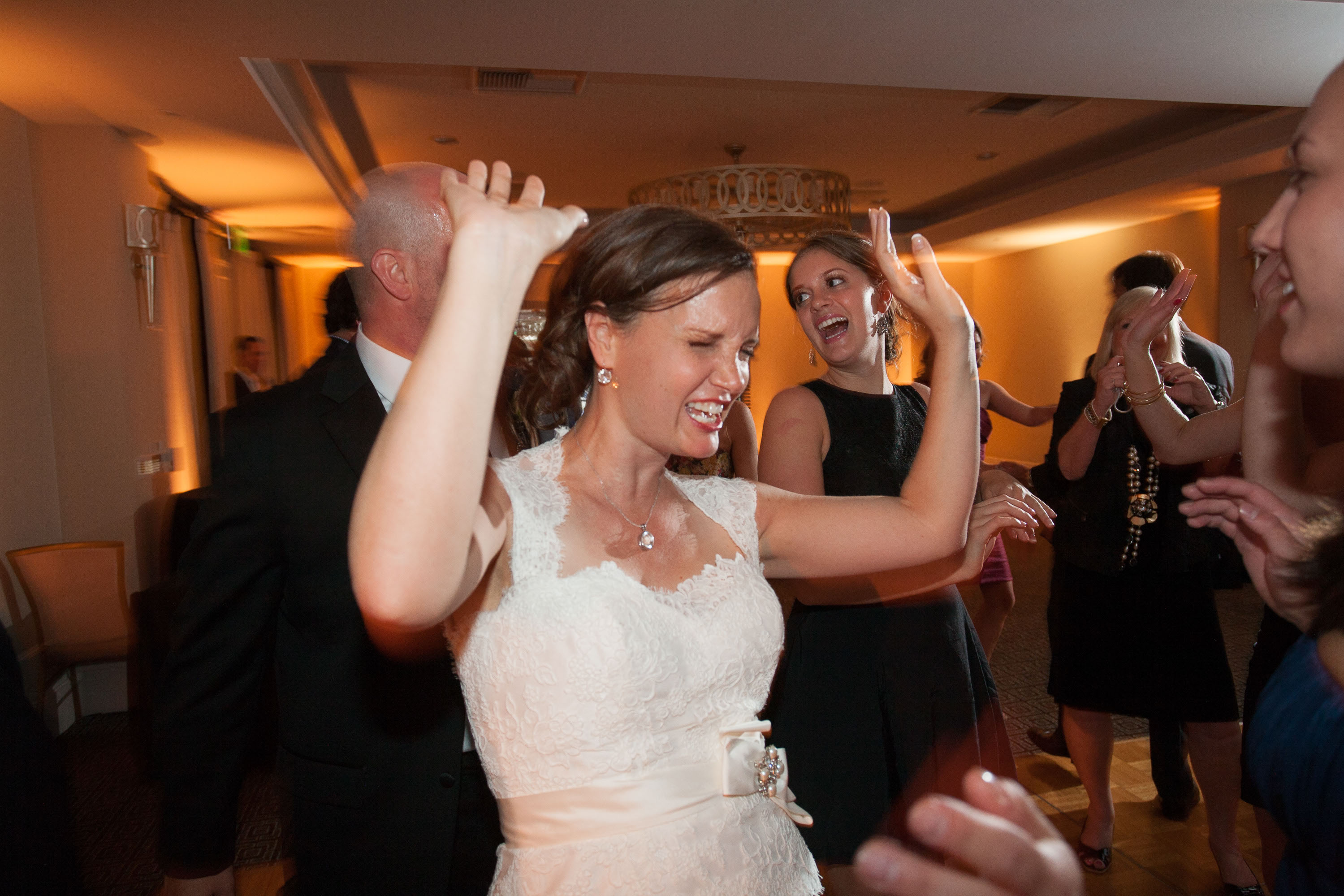 The bride dances at the Garden Court Hotel in Palo Alto