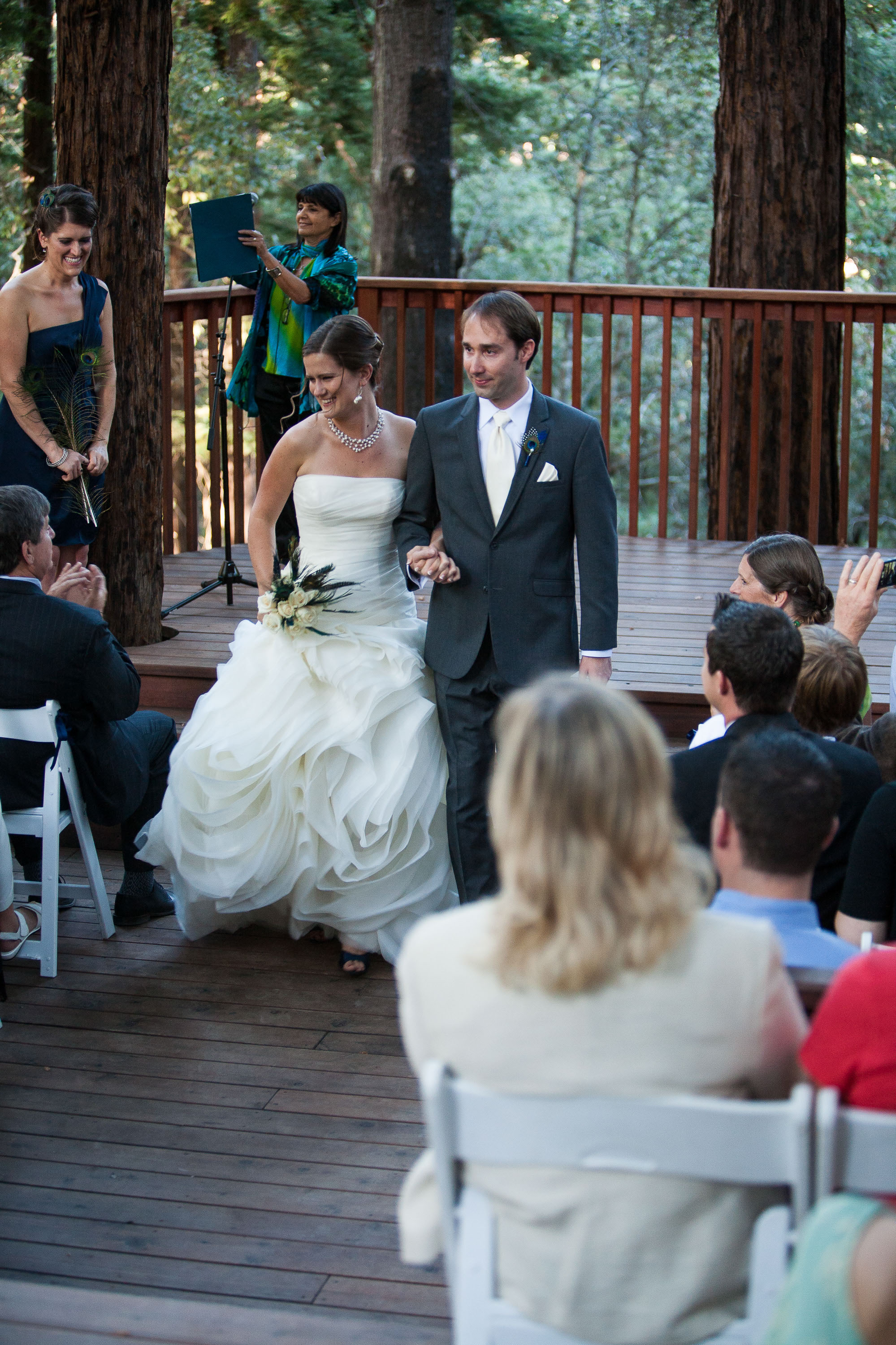 A bride and groom take their first steps as a married couple at Pema Osel Ling in the Santa Cruz mountains