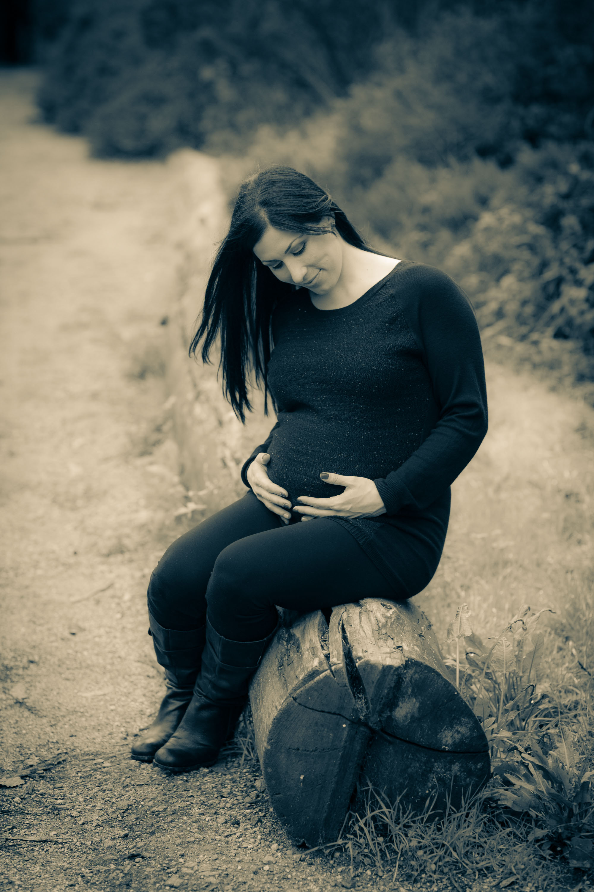 A stunning, rustic maternity portrait photographed in duotone by Checkerbox Photography.