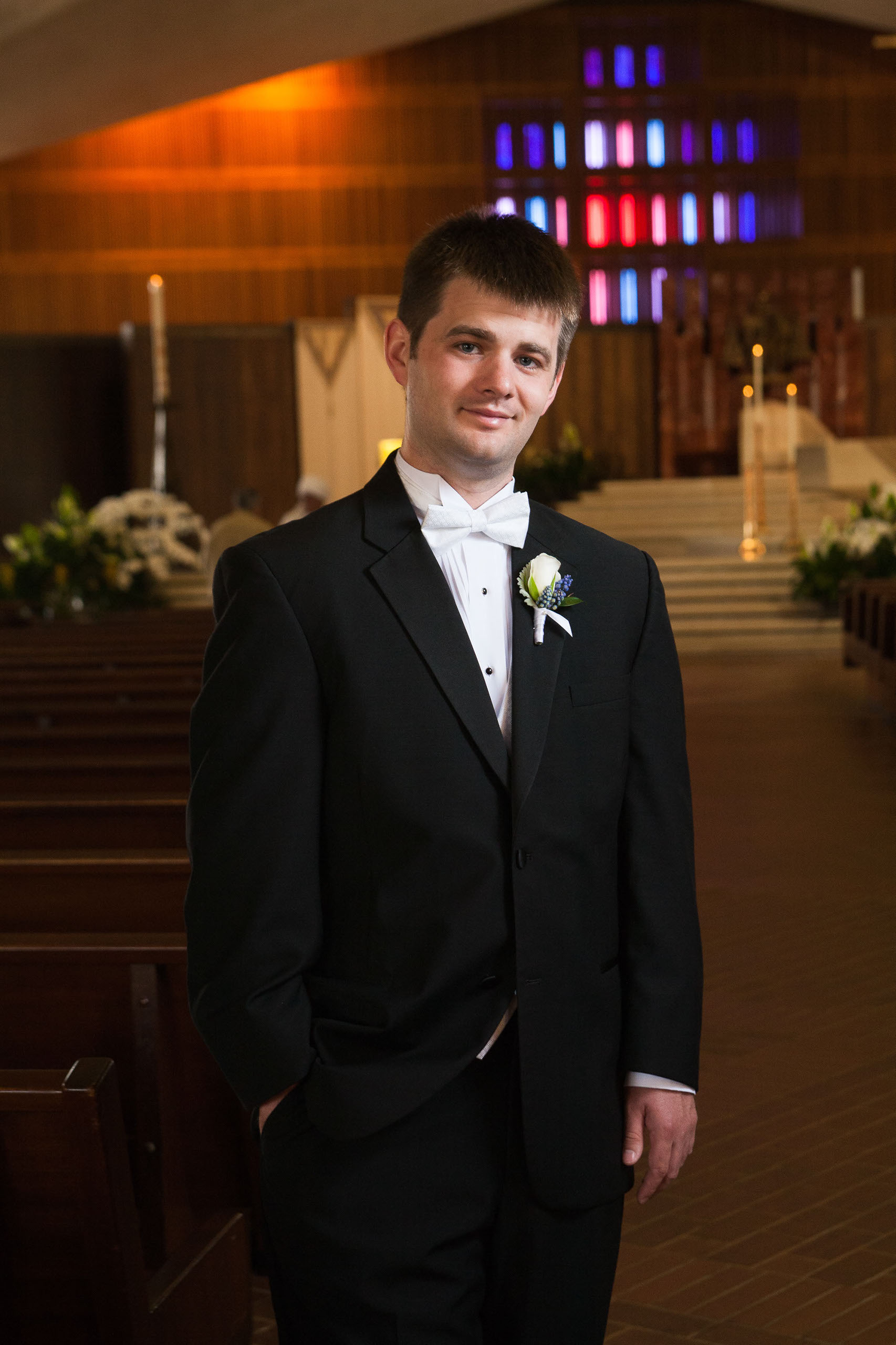 A classic formal portrait of the groom at St. Mary's Cathedral in San Francisco