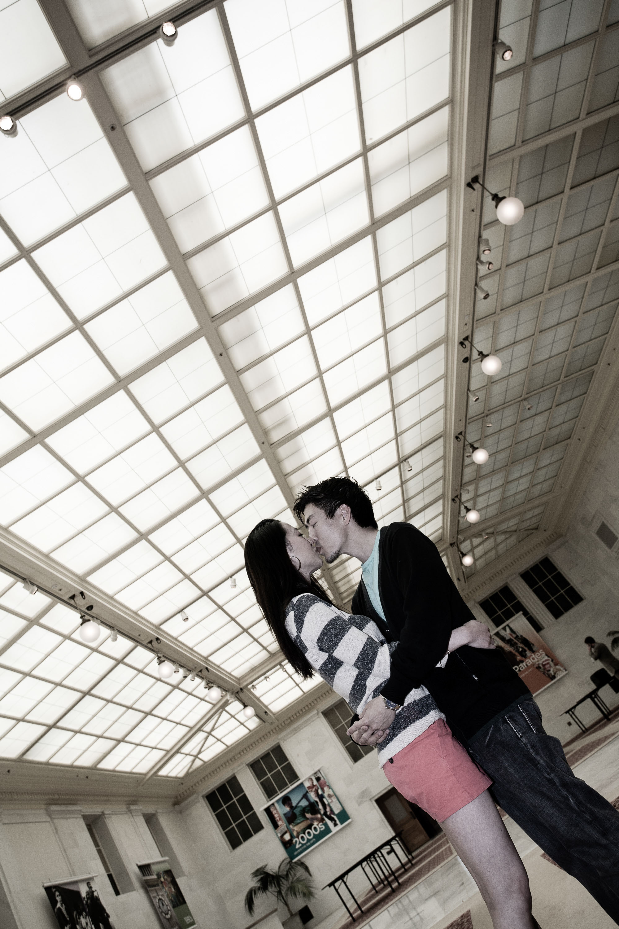 A dramatic kiss in the North Light Court at a San Francisco City Hall wedding