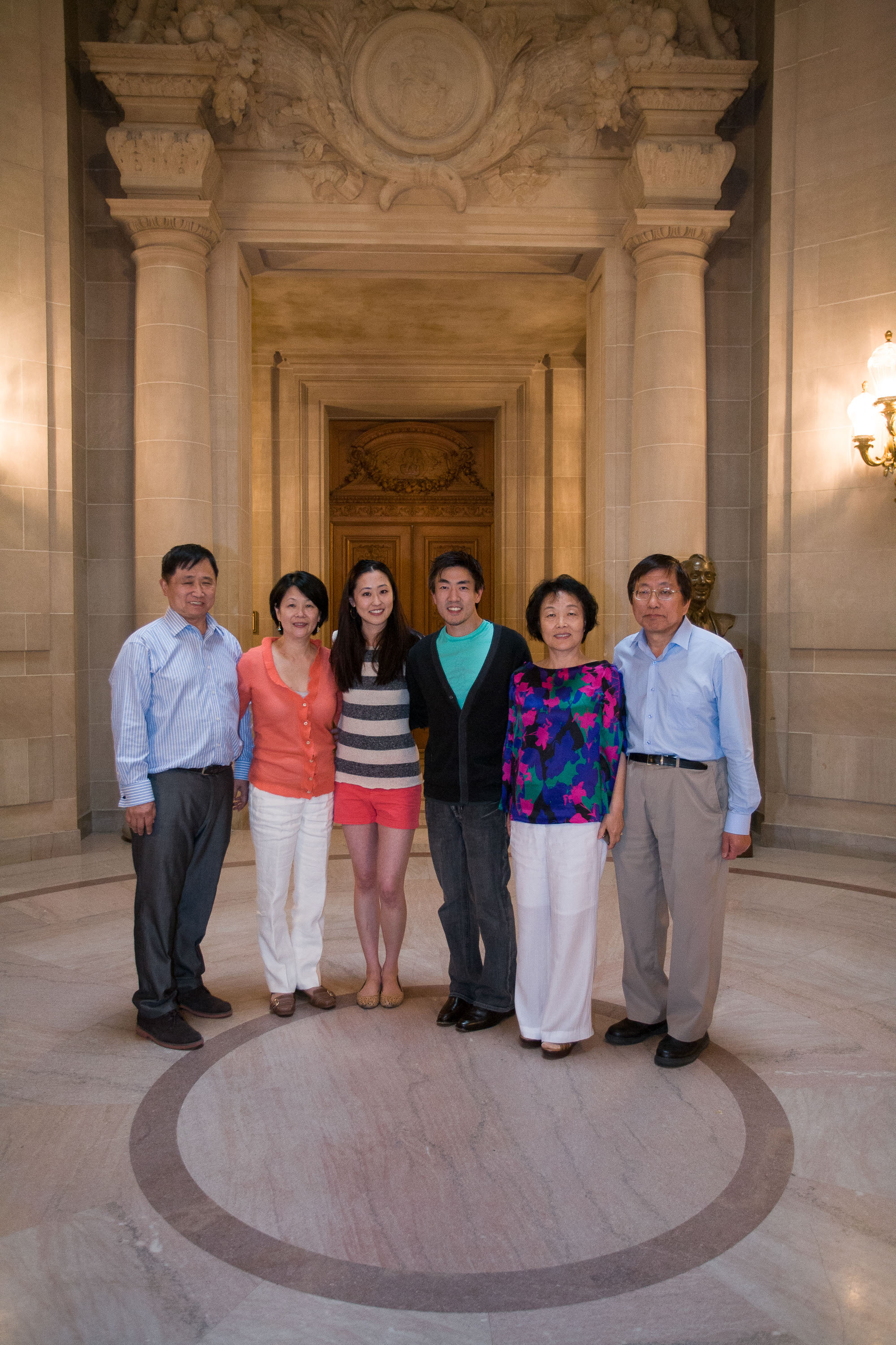 Two families together in the rotunda at a San Francisco City Hall wedding