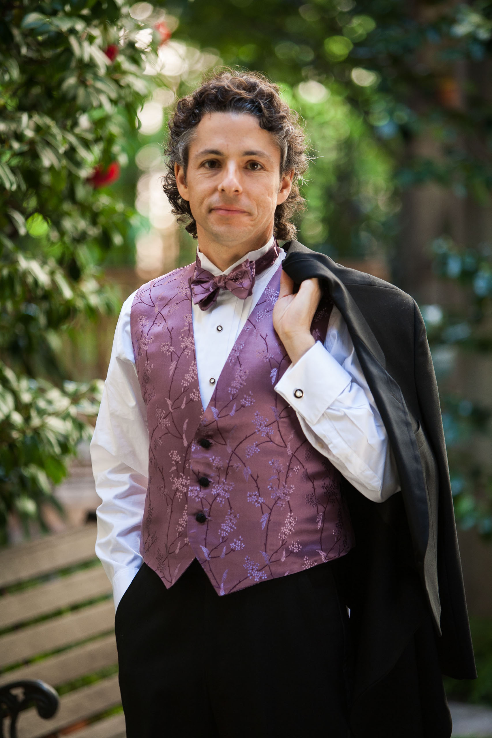 The groom rocks a custom purple vest at his wedding at the Berkeley City Club