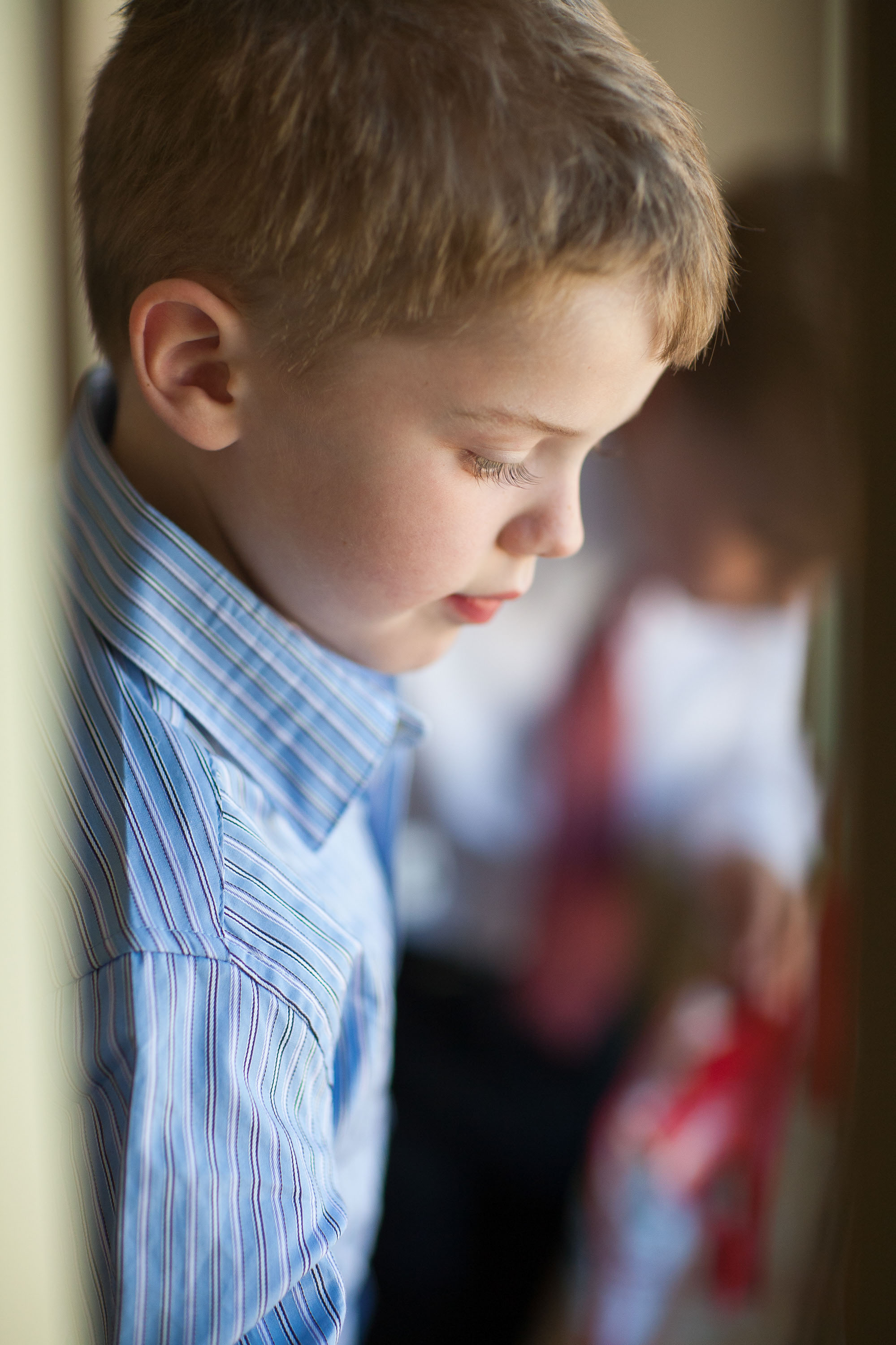 A beautiful window-lit portrait of a young boy at the St. Francis Hotel in San Francisco