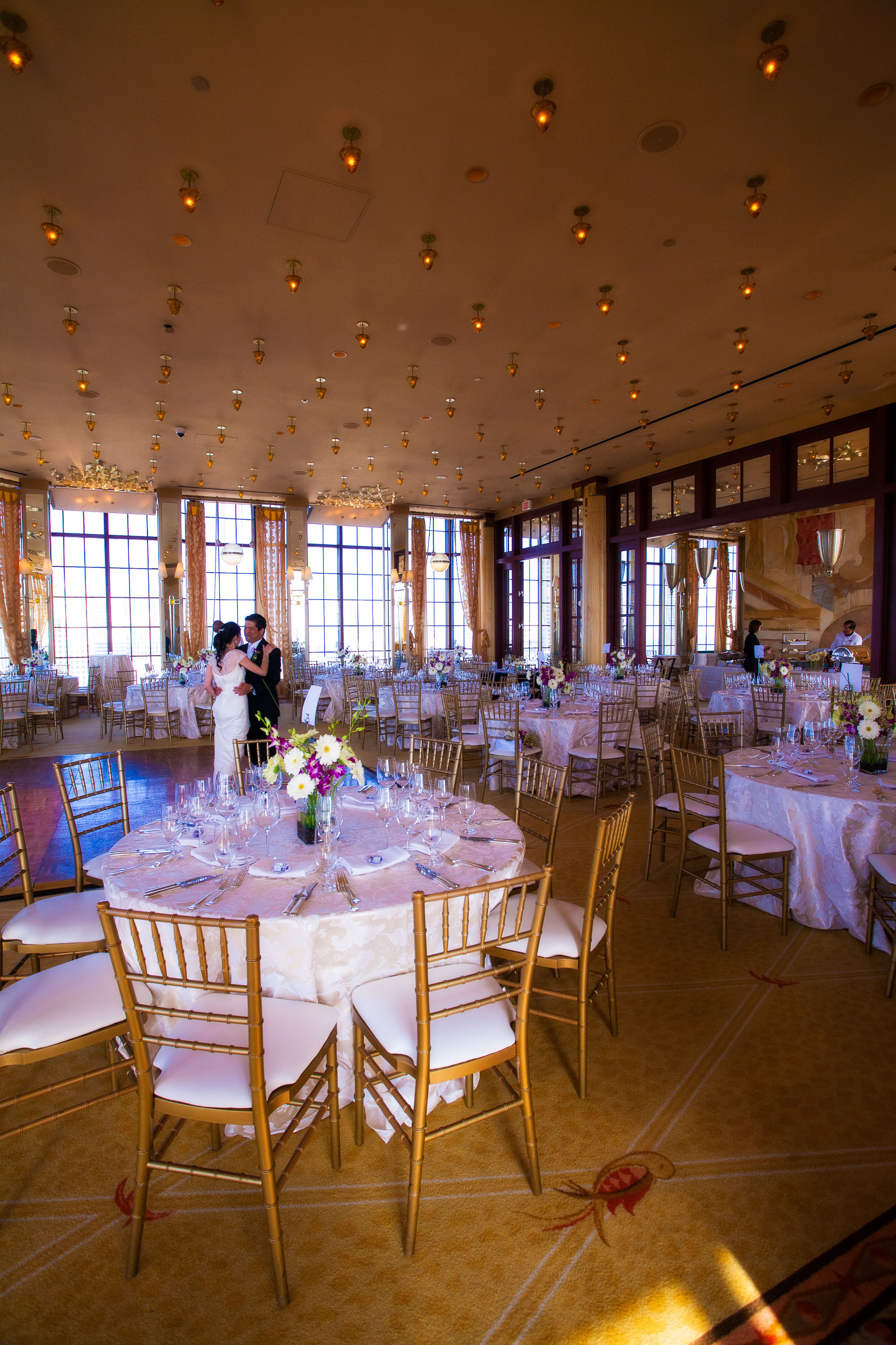 The bride and groom dance alone in the opulent Alexandria's Ballroom at the St. Francis Hotel in San Francisco