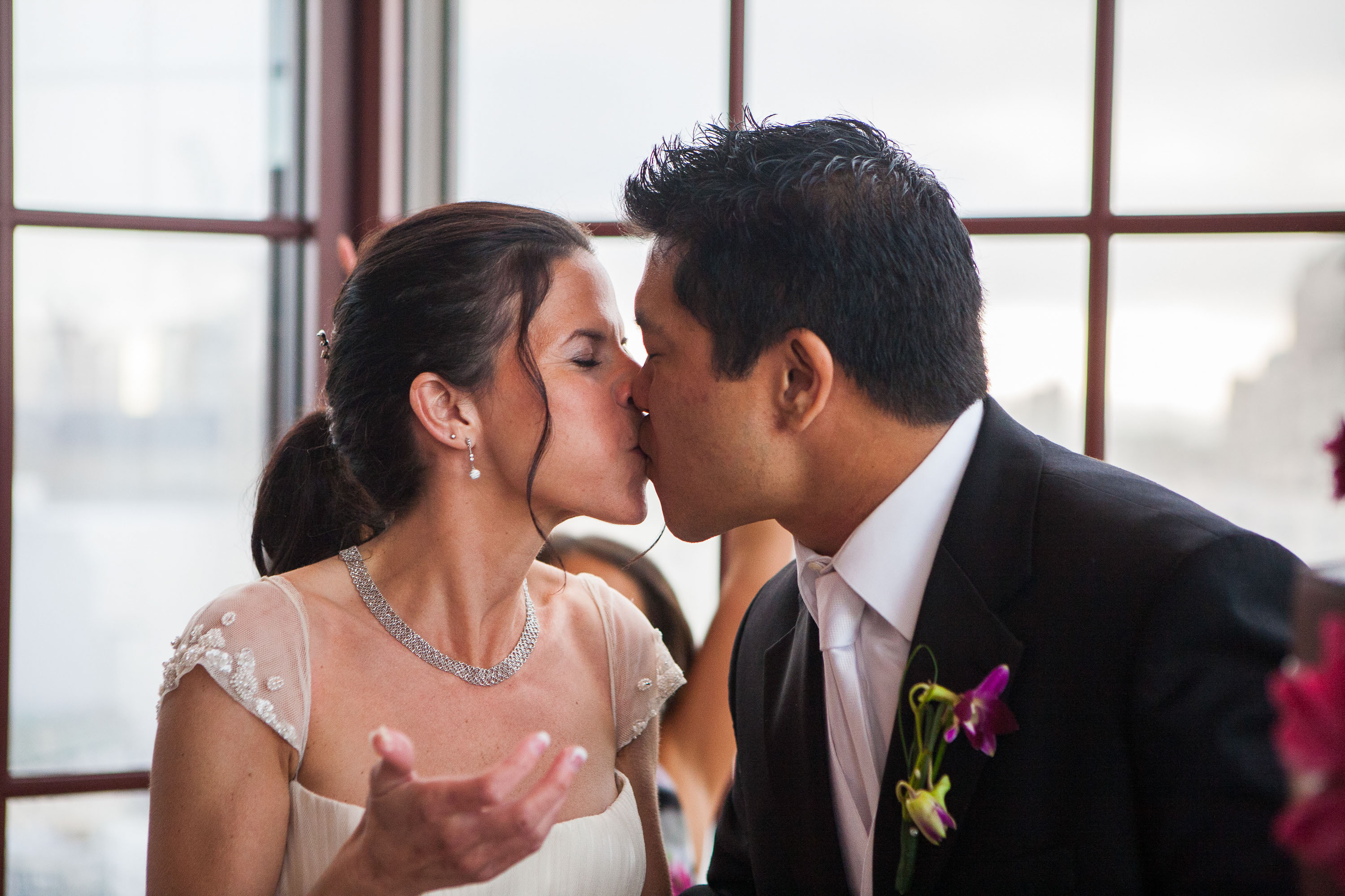 The couple kiss at their reception in Victor's Palace  at the St. Francis Hotel in San Francisco