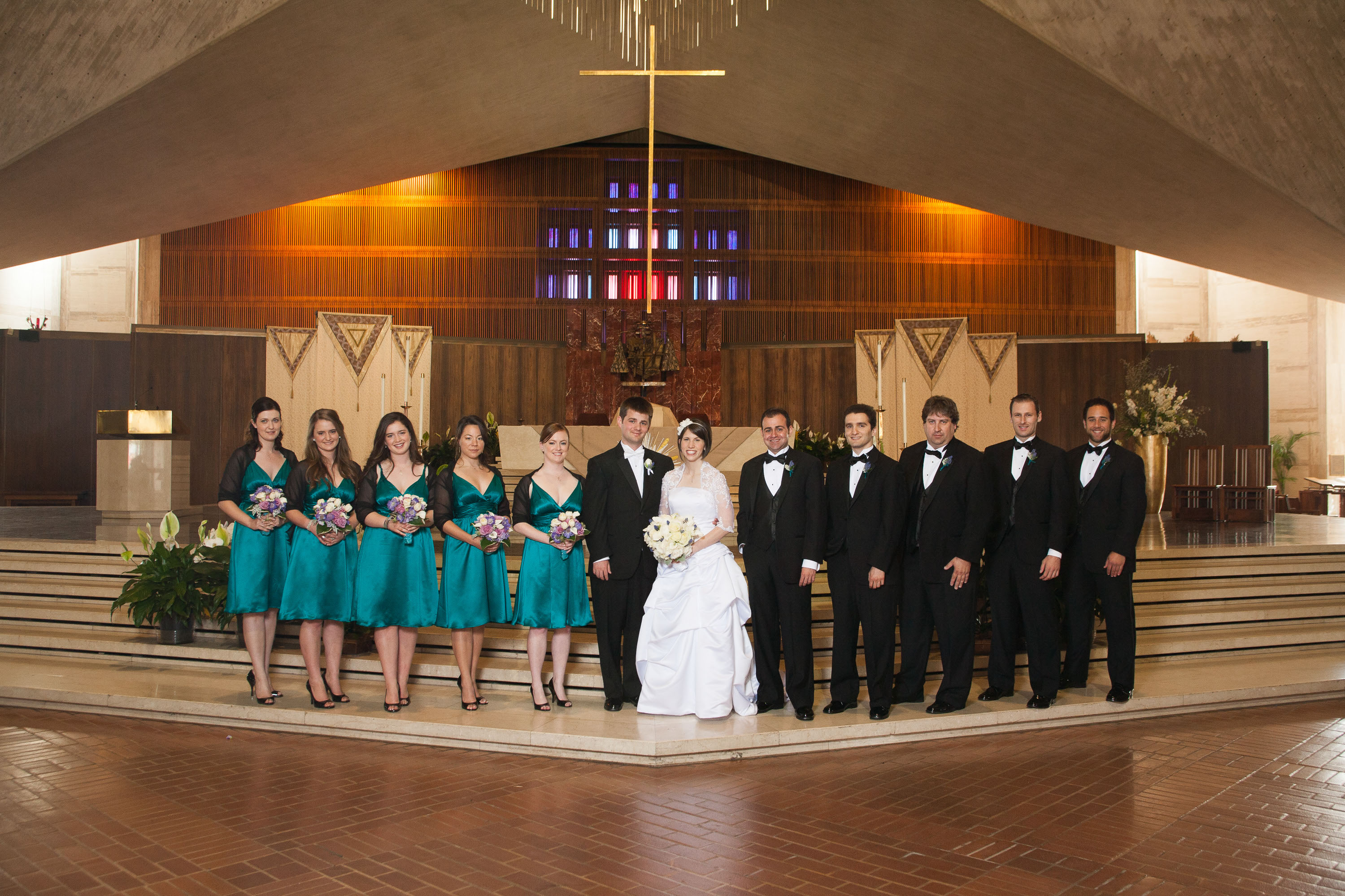 A formal portrait of the bridal party  at St. Mary's Cathedral in San Francisco.