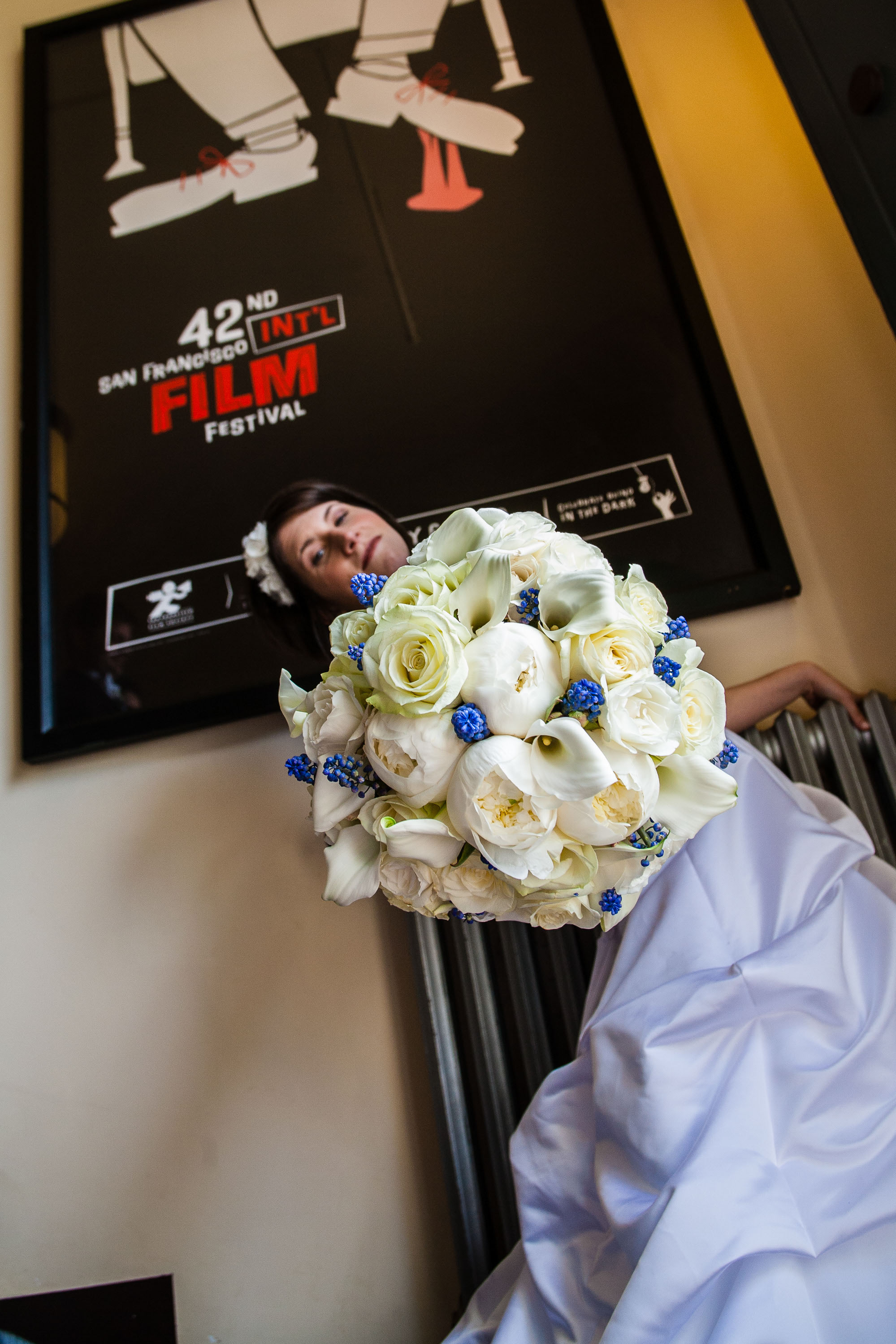 The bride strikes a dramatic pose at The San Francisco Film Centre