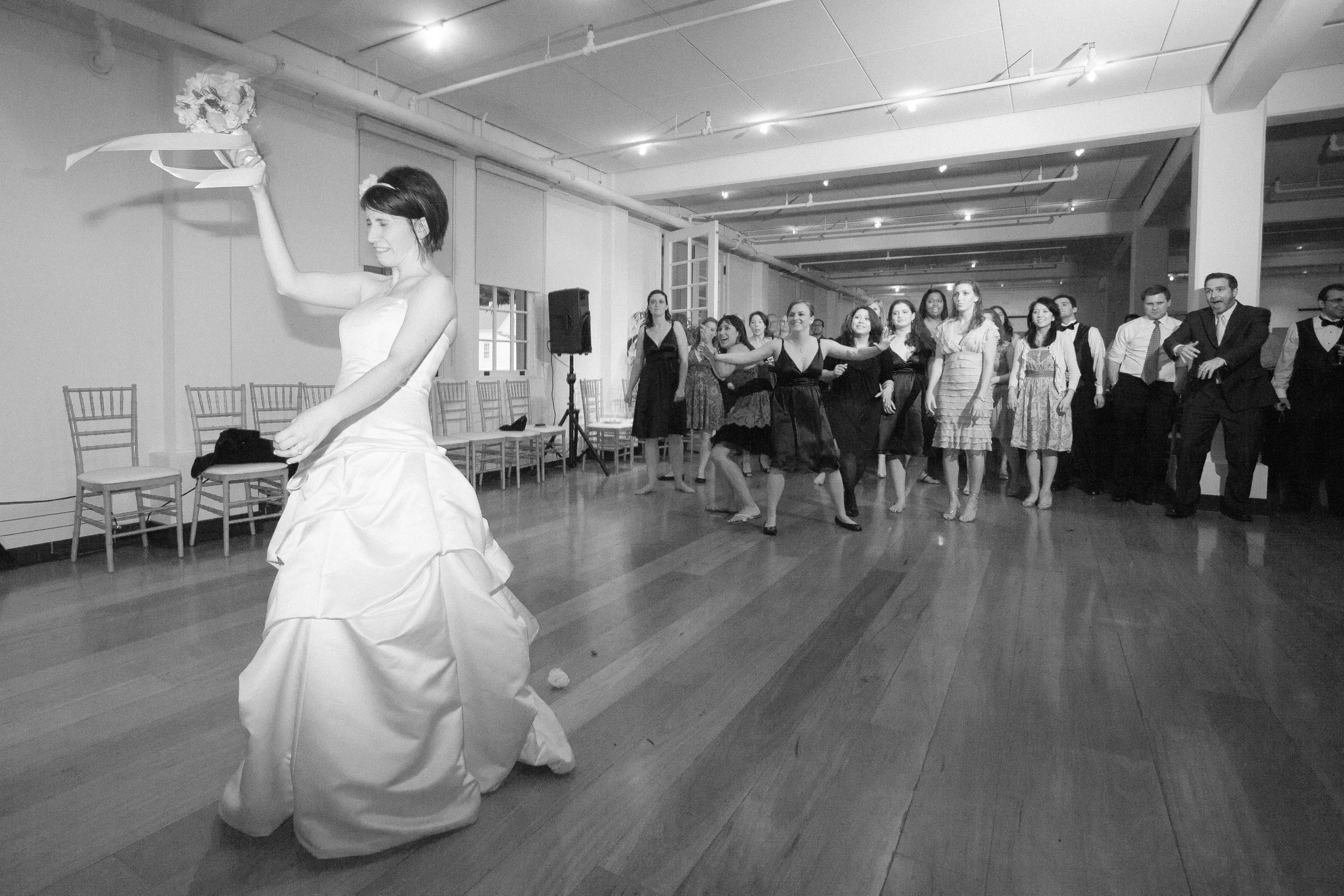 The bride gets ready to toss her bouquet, at The San Francisco Film Centre